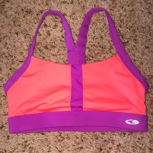 Campion neon pink and purple sports bra